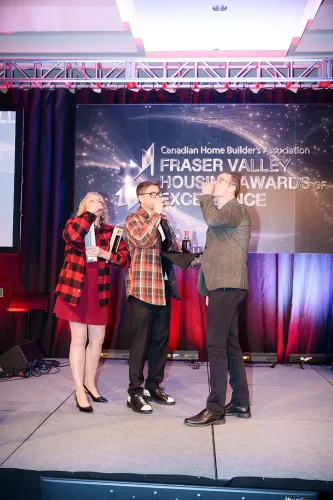 Syrup shots on stage as Cliff hosts the CHBA Fraser Valley Housing Awards of Excellence