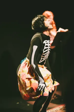 Cliff wearing the skeleton suit with a skirt