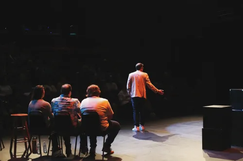 Cliff on stage hosting Very Very Improv show in Spring