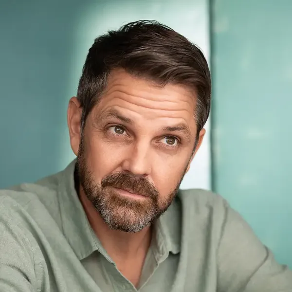 Cliff Prang in light green collared shirt