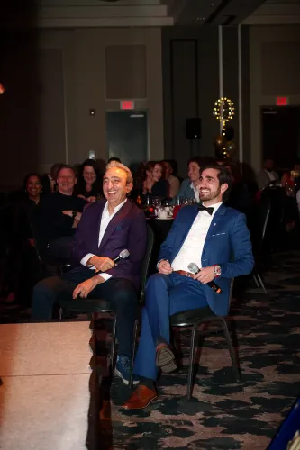 Audience members enjoying themselves at a Very Very Improv event for a corporate client