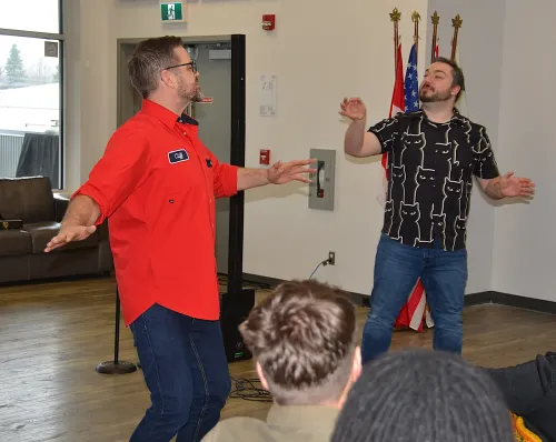 Cliff and Josh doing improv at the Rotary